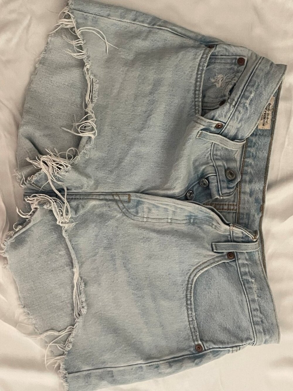 Levi’s 501 Button Fly Cutoff Denim Shorts Light Wash Raw Hem